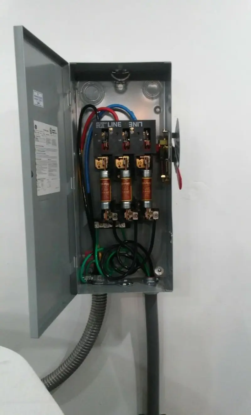 Three-phase disconnect switch installed for Smoke Detector Installation in Brownfield